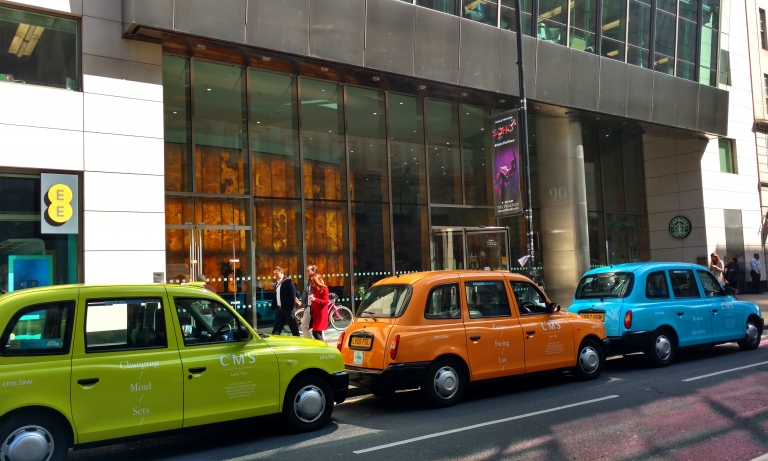 Neon-branding-for-CMS-LLP-taxis-advertising-examples