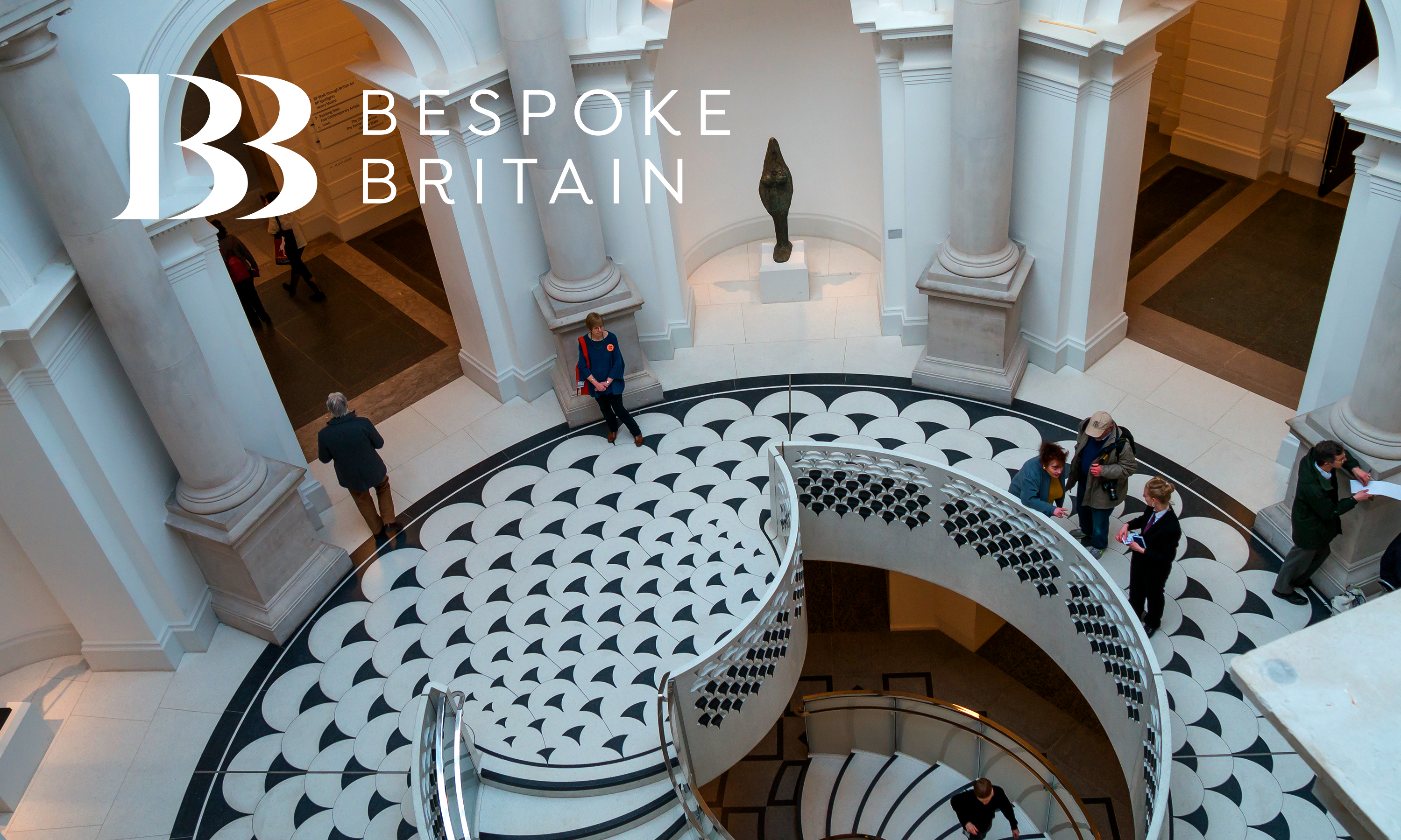 Bespoke Britain tours logo design by Neon over an tour image featuring a black and white stair well